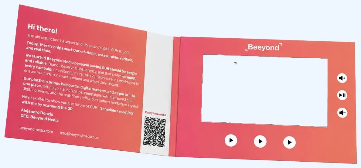 An open Herald for Beeyond Media: printed letter on the left, QR code, a video screen and buttons on the right